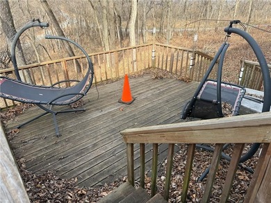 Beautiful multi-level home on a corner lot with fantastic on Holiday Island Golf Course in Arkansas - for sale on GolfHomes.com, golf home, golf lot