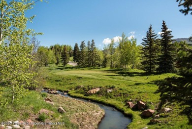 Nestled in the prestigious Maroon Green Townhomes, this on Maroon Creek Club in Colorado - for sale on GolfHomes.com, golf home, golf lot