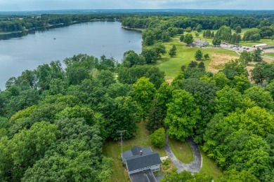 Situated on nearly 2.5 acres, this beautifully renovated farm on Meceola Country Club in Michigan - for sale on GolfHomes.com, golf home, golf lot