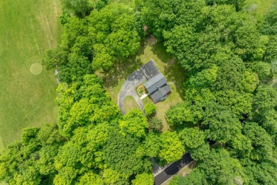 Situated on nearly 2.5 acres, this beautifully renovated farm on Meceola Country Club in Michigan - for sale on GolfHomes.com, golf home, golf lot