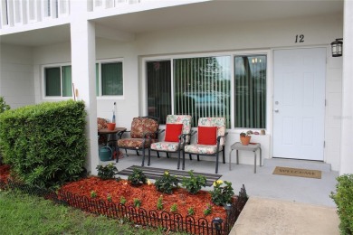 FIRST FLOOR with FRONT PORCH and BACK PATIO****Enjoy your on On Top Of The World Golf Course in Florida - for sale on GolfHomes.com, golf home, golf lot