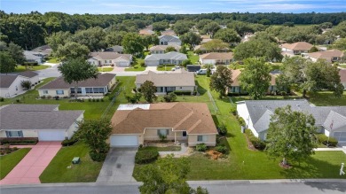 ROOF 2024! AC 2017! This spacious PALM 2 Model in Spruce Creek on Preserve Golf Club in Florida - for sale on GolfHomes.com, golf home, golf lot