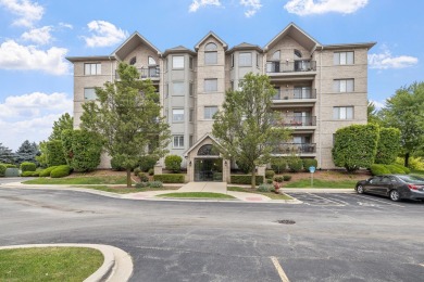 Beautiful views of trees and ponds from the 3rd floor condo in on Village Greens of Woodridge Golf Course in Illinois - for sale on GolfHomes.com, golf home, golf lot