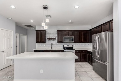 Charming 3 bed, 2.5 bath single-story home in a quiet, gated on The Legacy Golf Resort in Arizona - for sale on GolfHomes.com, golf home, golf lot