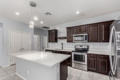 Charming 3 bed, 2.5 bath single-story home in a quiet, gated on The Legacy Golf Resort in Arizona - for sale on GolfHomes.com, golf home, golf lot