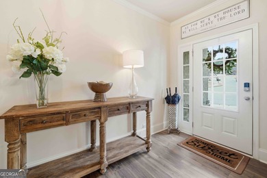 Located in the sought-after Georgian subdivision, this beautiful on The Frog Golf Club in Georgia - for sale on GolfHomes.com, golf home, golf lot