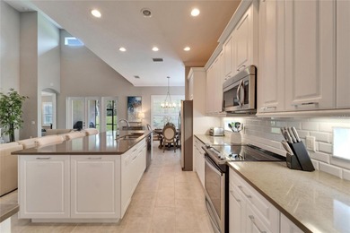 Turnkey & Fully Furnished | Luxury Living in Grasslands' on Grasslands Golf and Country Club in Florida - for sale on GolfHomes.com, golf home, golf lot