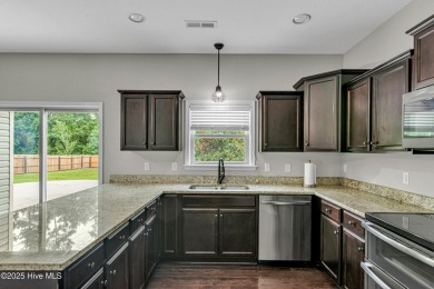 Welcome to 319 Bear Run - the ideal home for a large or on Bear Trail Golf Club in North Carolina - for sale on GolfHomes.com, golf home, golf lot