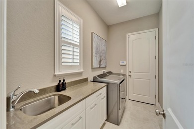 Turnkey Luxury Living in Grasslands' Exclusive Laurel Glen on Grasslands Golf and Country Club in Florida - for sale on GolfHomes.com, golf home, golf lot