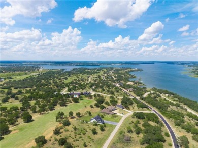 This exquisite custom residence within the great Hideout on Hideout Golf Club and Resort  in Texas - for sale on GolfHomes.com, golf home, golf lot