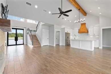 This exquisite custom residence within the great Hideout on Hideout Golf Club and Resort  in Texas - for sale on GolfHomes.com, golf home, golf lot