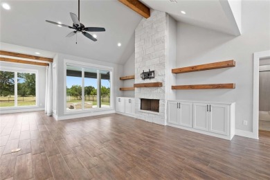 This exquisite custom residence within the great Hideout on Hideout Golf Club and Resort  in Texas - for sale on GolfHomes.com, golf home, golf lot