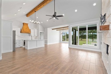 This exquisite custom residence within the great Hideout on Hideout Golf Club and Resort  in Texas - for sale on GolfHomes.com, golf home, golf lot