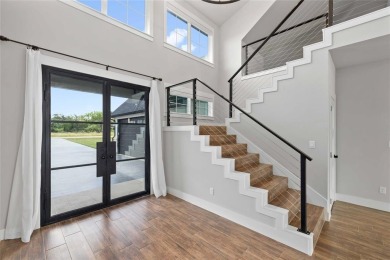 This exquisite custom residence within the great Hideout on Hideout Golf Club and Resort  in Texas - for sale on GolfHomes.com, golf home, golf lot