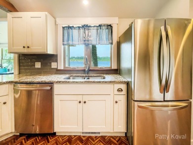 Gorgeous 3 bedrooms & 3 1/2 baths home includes choice of 2 on Orchard Hills Golf Course in Michigan - for sale on GolfHomes.com, golf home, golf lot