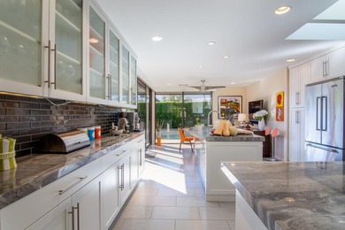 Step through the private and peaceful front courtyard into this on The Springs Country Club in California - for sale on GolfHomes.com, golf home, golf lot