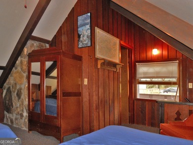 Escape the heat and enjoy cool mountain living in this furnished on Sky Valley Resort and Country Club in Georgia - for sale on GolfHomes.com, golf home, golf lot
