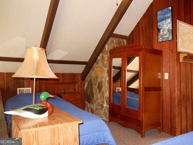 Escape the heat and enjoy cool mountain living in this furnished on Sky Valley Resort and Country Club in Georgia - for sale on GolfHomes.com, golf home, golf lot