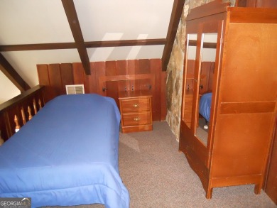 Escape the heat and enjoy cool mountain living in this furnished on Sky Valley Resort and Country Club in Georgia - for sale on GolfHomes.com, golf home, golf lot