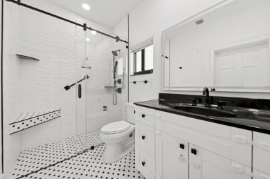 Elegant 4‑Bed, 51/2‑Bath Home in St. Andrews Country on St. Andrews Country Club of Boca Raton in Florida - for sale on GolfHomes.com, golf home, golf lot