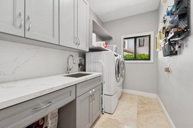 Elegant 4‑Bed, 51/2‑Bath Home in St. Andrews Country on St. Andrews Country Club of Boca Raton in Florida - for sale on GolfHomes.com, golf home, golf lot
