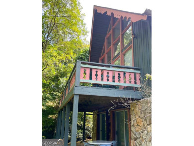 Escape the heat and enjoy cool mountain living in this furnished on Sky Valley Resort and Country Club in Georgia - for sale on GolfHomes.com, golf home, golf lot