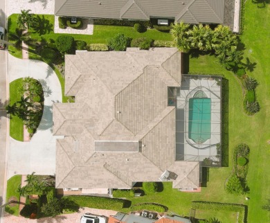 Elegant 4‑Bed, 51/2‑Bath Home in St. Andrews Country on St. Andrews Country Club of Boca Raton in Florida - for sale on GolfHomes.com, golf home, golf lot