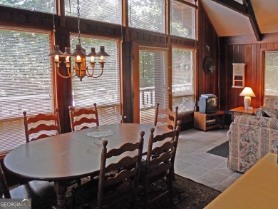Escape the heat and enjoy cool mountain living in this furnished on Sky Valley Resort and Country Club in Georgia - for sale on GolfHomes.com, golf home, golf lot