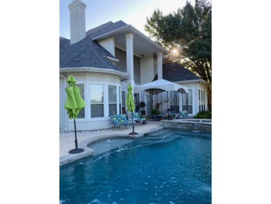30 minutes from Downtown Dallas, this beautiful custom built on Thorntree Country Club in Texas - for sale on GolfHomes.com, golf home, golf lot