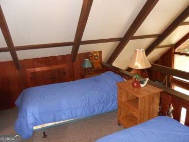 Escape the heat and enjoy cool mountain living in this furnished on Sky Valley Resort and Country Club in Georgia - for sale on GolfHomes.com, golf home, golf lot