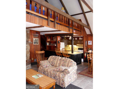 Escape the heat and enjoy cool mountain living in this furnished on Sky Valley Resort and Country Club in Georgia - for sale on GolfHomes.com, golf home, golf lot