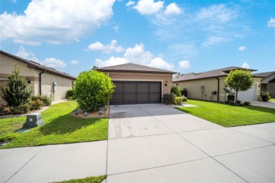 As you pull up to this gorgeous, well-maintained Crestview home on Stone Creek Golf Club in Florida - for sale on GolfHomes.com, golf home, golf lot