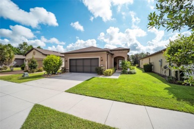 As you pull up to this gorgeous, well-maintained Crestview home on Stone Creek Golf Club in Florida - for sale on GolfHomes.com, golf home, golf lot