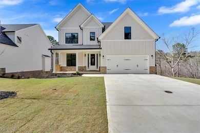 This beautiful two-story home on a full unfinished basement is on The Plantation Golf Club in Georgia - for sale on GolfHomes.com, golf home, golf lot