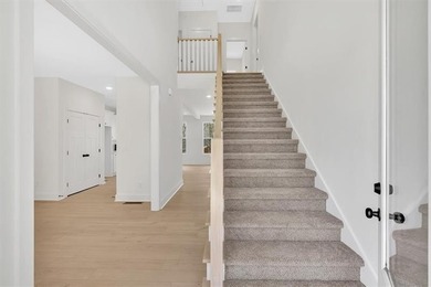 This beautiful two-story home on a full unfinished basement is on The Plantation Golf Club in Georgia - for sale on GolfHomes.com, golf home, golf lot