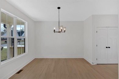 This beautiful two-story home on a full unfinished basement is on The Plantation Golf Club in Georgia - for sale on GolfHomes.com, golf home, golf lot