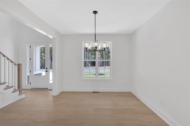 This beautiful two-story home on a full unfinished basement is on The Plantation Golf Club in Georgia - for sale on GolfHomes.com, golf home, golf lot