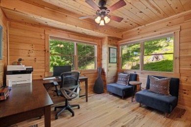 Discover this Custom Built Jubach Log Home perfectly placed on a on Hide-A-Way Hills Golf Club in Ohio - for sale on GolfHomes.com, golf home, golf lot