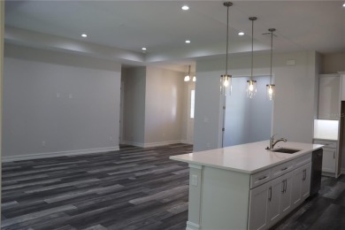 This stunning and luxurious new home by Spire Homes, a on Southern Hills Plantation Club in Florida - for sale on GolfHomes.com, golf home, golf lot