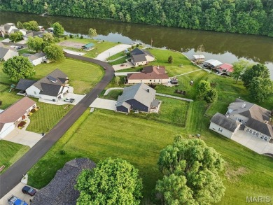 This beautiful, flat, cleared lot near the water is your ticket on Incline Village Golf Course in Missouri - for sale on GolfHomes.com, golf home, golf lot