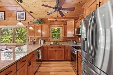 Discover this Custom Built Jubach Log Home perfectly placed on a on Hide-A-Way Hills Golf Club in Ohio - for sale on GolfHomes.com, golf home, golf lot