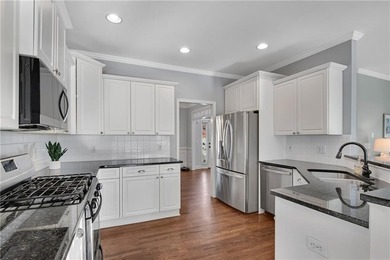 Nestled in the highly sought-after Brookstone Country Club on Brookstone Golf and Country Club in Georgia - for sale on GolfHomes.com, golf home, golf lot