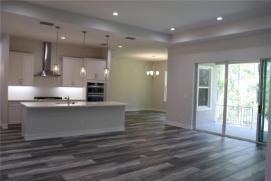 This stunning and luxurious new home by Spire Homes, a on Southern Hills Plantation Club in Florida - for sale on GolfHomes.com, golf home, golf lot