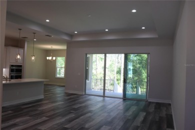 This stunning and luxurious new home by Spire Homes, a on Southern Hills Plantation Club in Florida - for sale on GolfHomes.com, golf home, golf lot