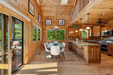 Discover this Custom Built Jubach Log Home perfectly placed on a on Hide-A-Way Hills Golf Club in Ohio - for sale on GolfHomes.com, golf home, golf lot