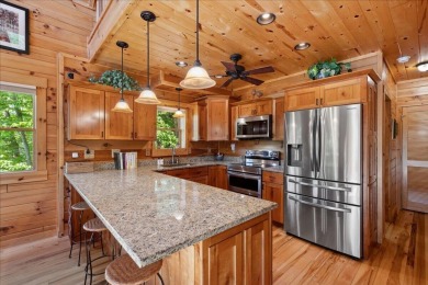 Discover this Custom Built Jubach Log Home perfectly placed on a on Hide-A-Way Hills Golf Club in Ohio - for sale on GolfHomes.com, golf home, golf lot