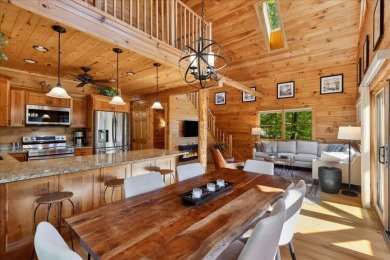 Discover this Custom Built Jubach Log Home perfectly placed on a on Hide-A-Way Hills Golf Club in Ohio - for sale on GolfHomes.com, golf home, golf lot