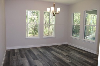 This stunning and luxurious new home by Spire Homes, a on Southern Hills Plantation Club in Florida - for sale on GolfHomes.com, golf home, golf lot