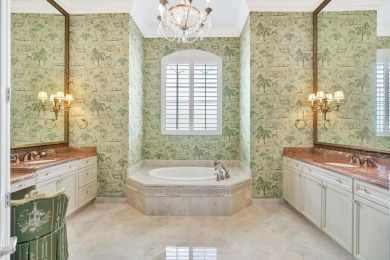 Welcome home to this immaculate 4-bedroom, 4 Bath, one-story on Jupiter Country Club in Florida - for sale on GolfHomes.com, golf home, golf lot