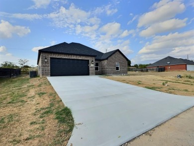 You have got to see this absolutely wonderful new home. It on The Club At Runaway Bay in Texas - for sale on GolfHomes.com, golf home, golf lot